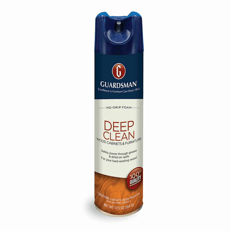 A blue spray bottle that deep cleans wooden furniture by the brand guardsman